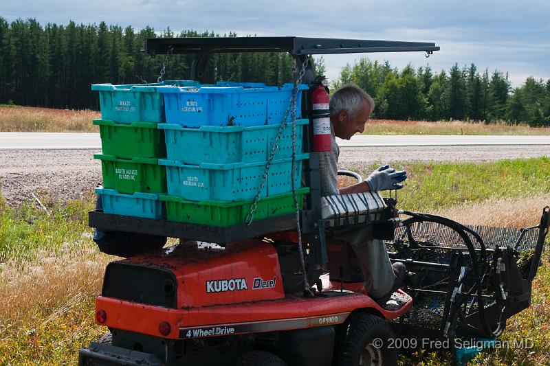 20090829_132620 D3 (1).jpg - View of vehicle used to 'pick' the blueberries, Lake St Jean Region
